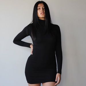 EMMYDEVEAUX COMPRESSION TURTLENECK MINI BODYCON